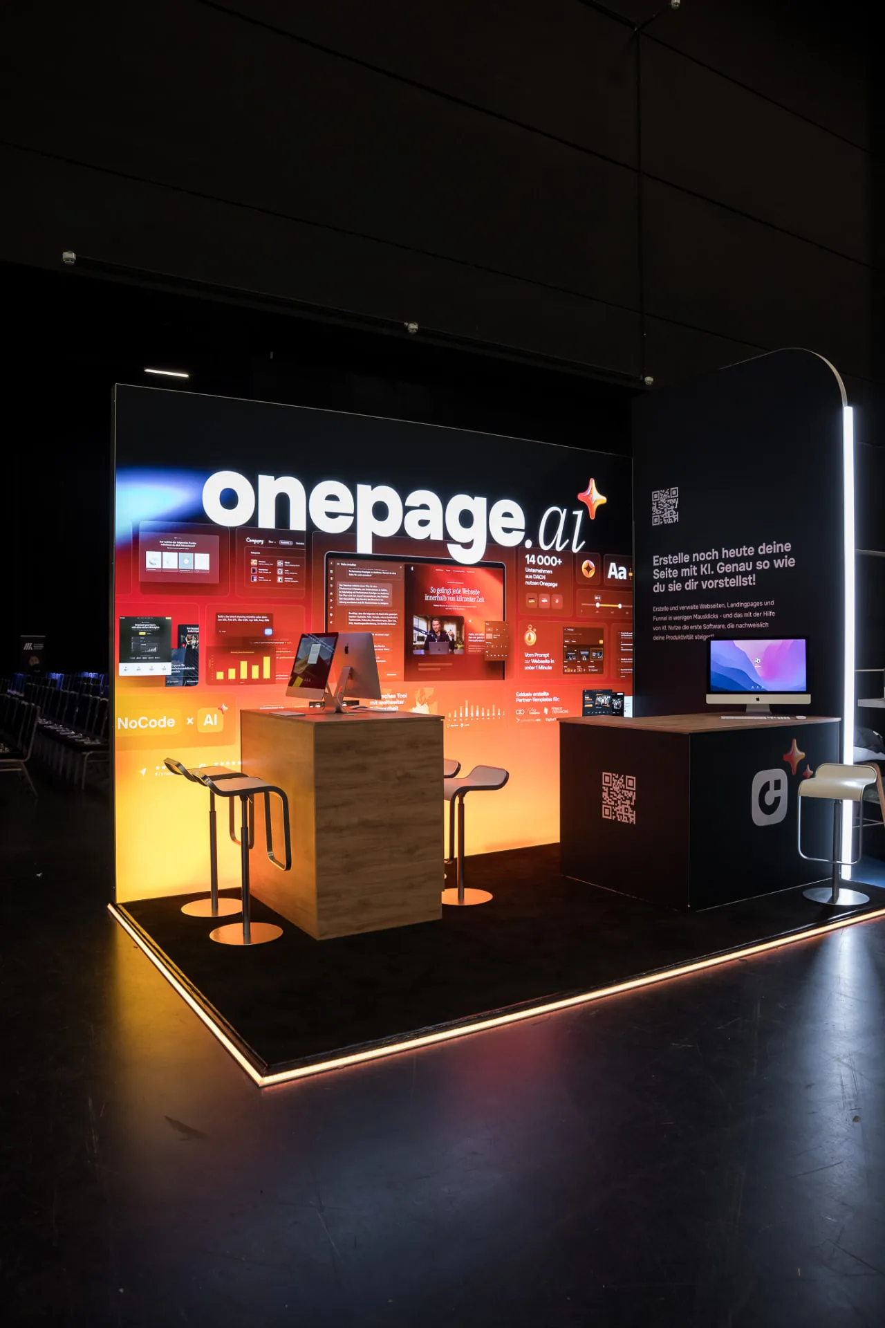 onepage.ai — Dark floor with warm LED edge